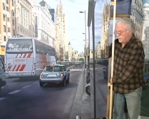 José Miguel Palacio entre sus pinturas (imagen captura de TV)